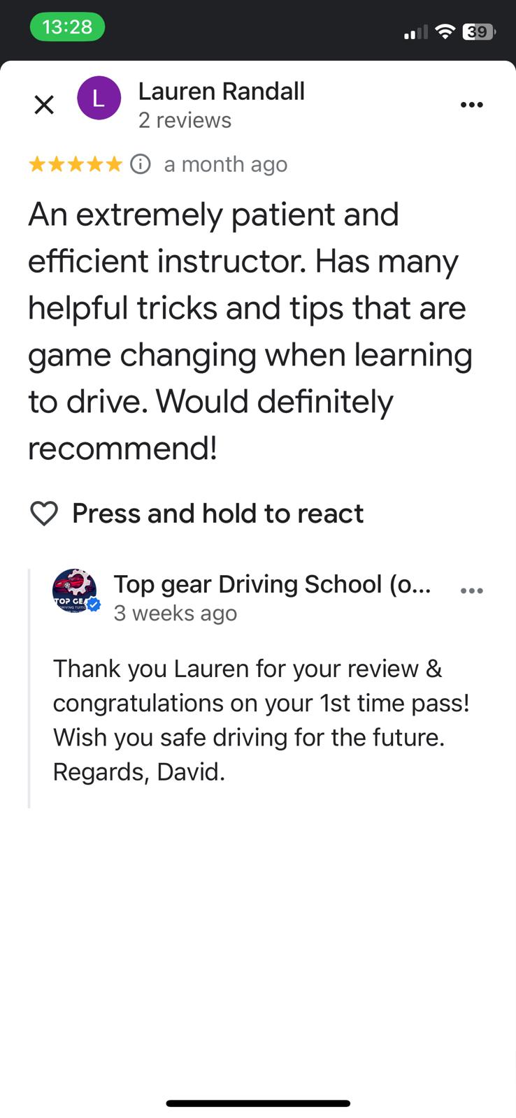 Student 1 celebrating passing their driving test with Top Gear Driving School