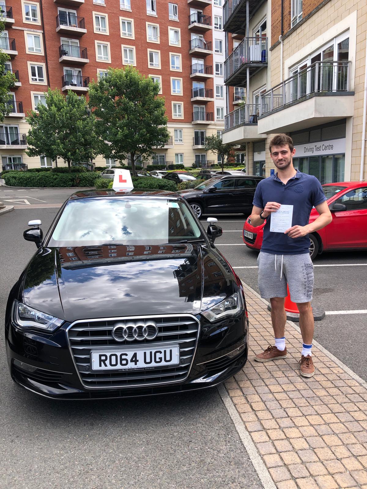 Student 12 celebrating passing their driving test with Top Gear Driving School
