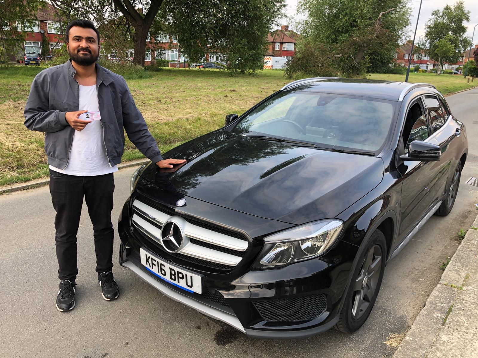 Student 15 celebrating passing their driving test with Top Gear Driving School