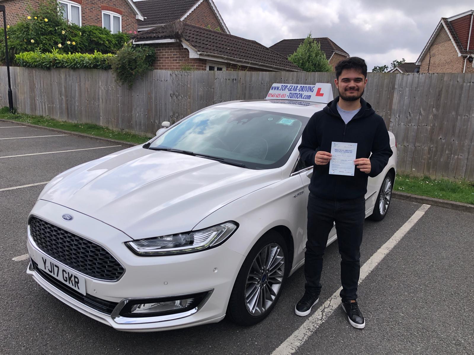 Student 18 celebrating passing their driving test with Top Gear Driving School