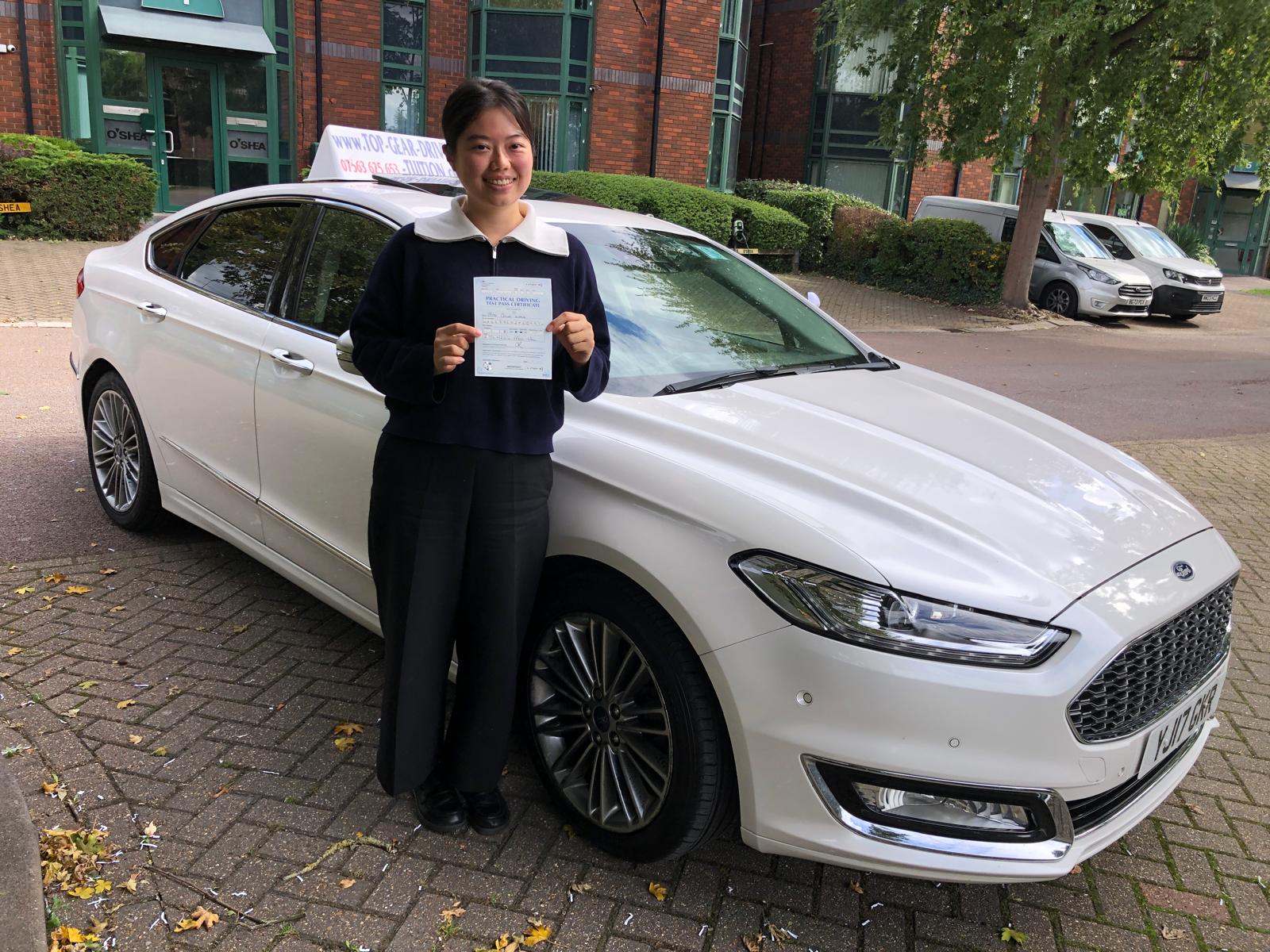 Student 7 celebrating passing their driving test with Top Gear Driving School